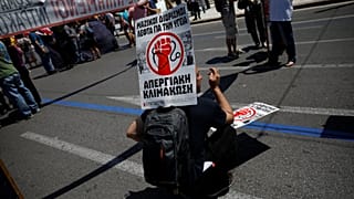 Striking Greek workers brought Athens to a halt on Wednesday