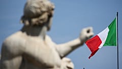 The Italian flag waves over the Quirinal Palace in Rome
