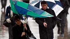 Torrential rain and thunderstorms cause 'travel chaos' in UK