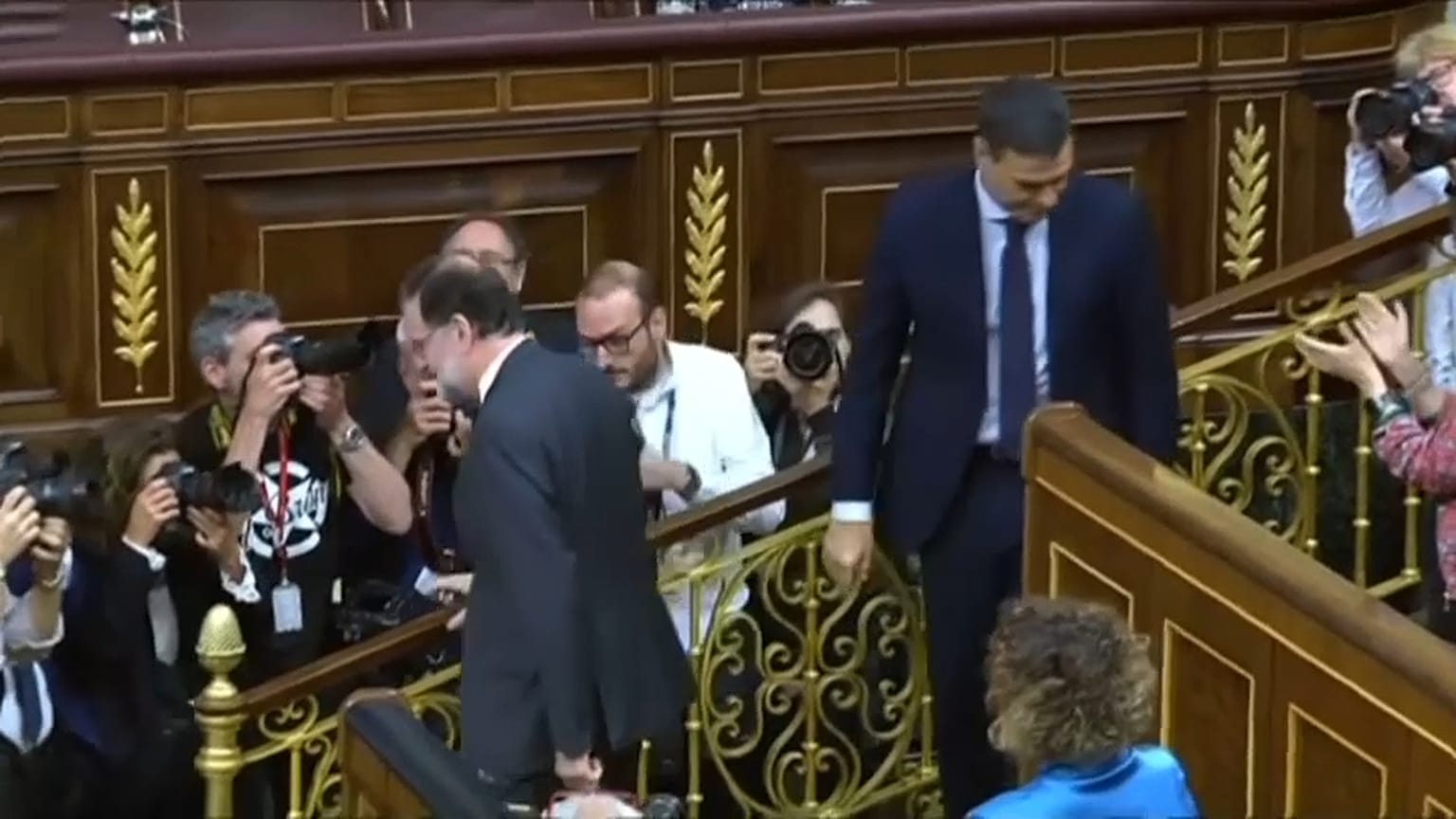 Ousted Spanish prime minister Mariano Rajoy and his successor 