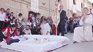 Colachos jump over Spanish babies to bring them good luck 