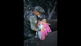 Guatemala, bimba salvata dalla cenere
