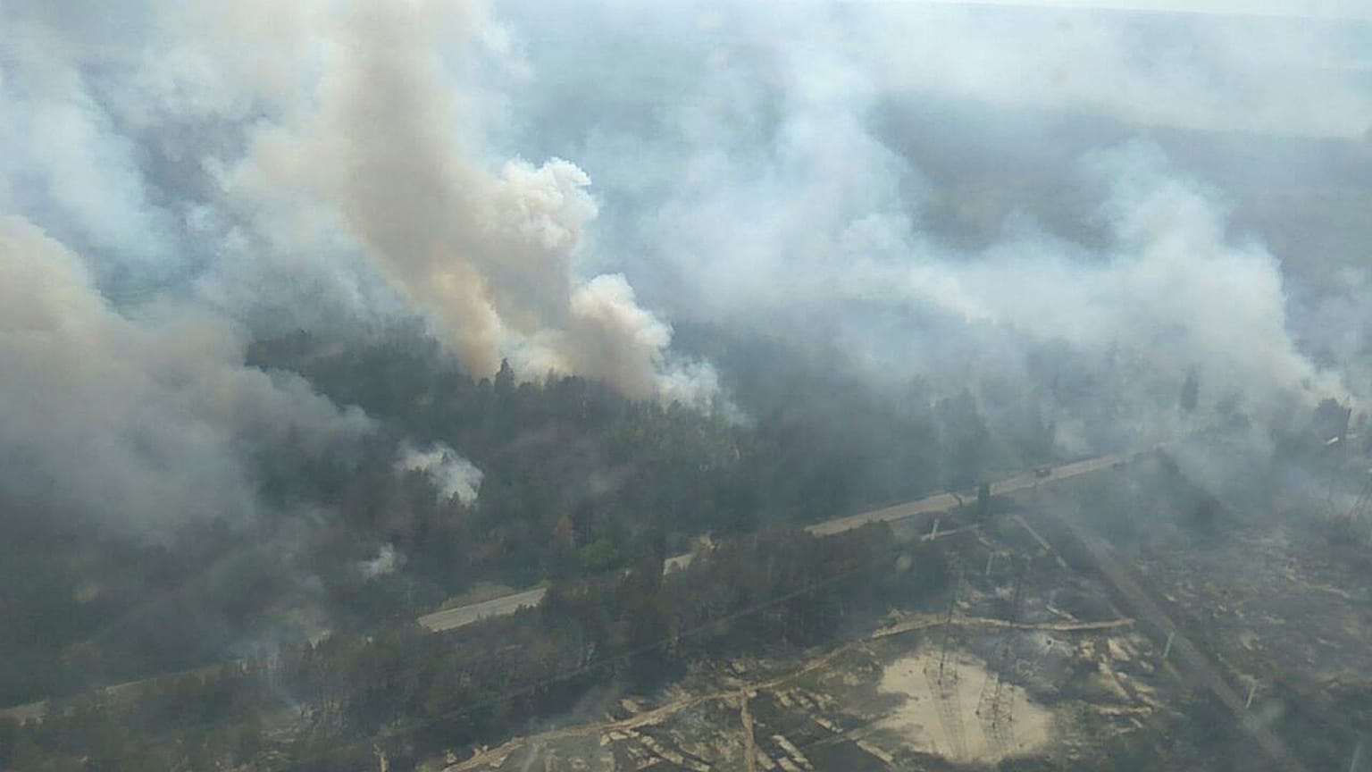 Chernobyl wildfire scorches past exclusion zone, arson suspected