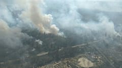 Chernobyl wildfire scorches past exclusion zone, arson suspected