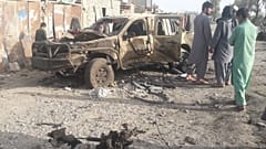 An Afghan army vehilce destroyed in fighting with the Taliban