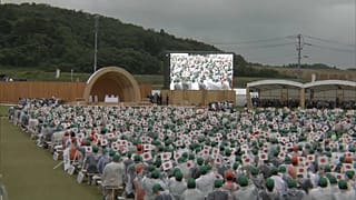 Japan's Emperor and Empress plant trees at Fukushima