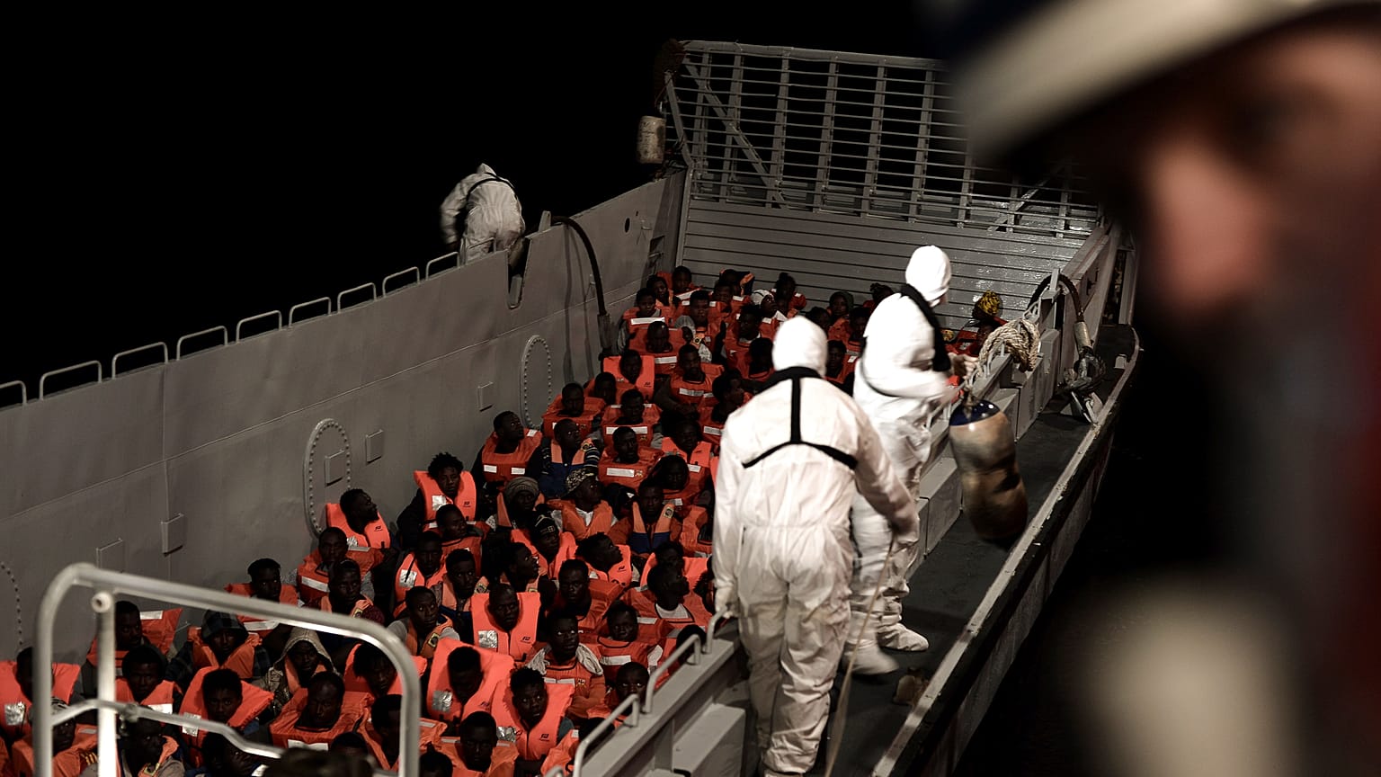 Rescued migrants to be transferred from overloaded ship for voyage to Spain