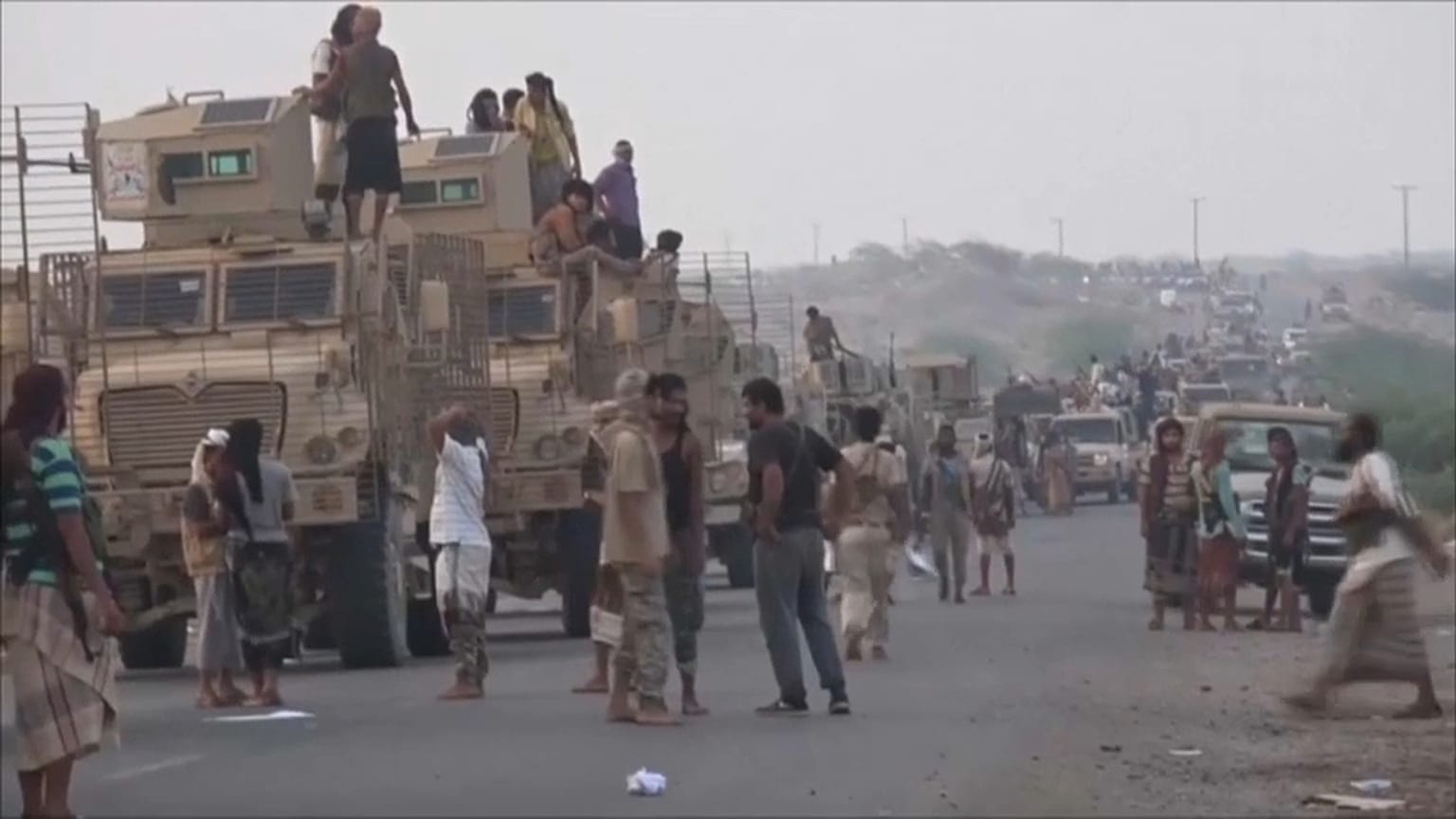 Coalition ground forces mass on the outskirts of Hodeida.