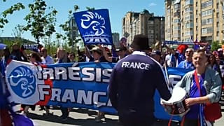 Les Bleus and Socceroos' fans mingle