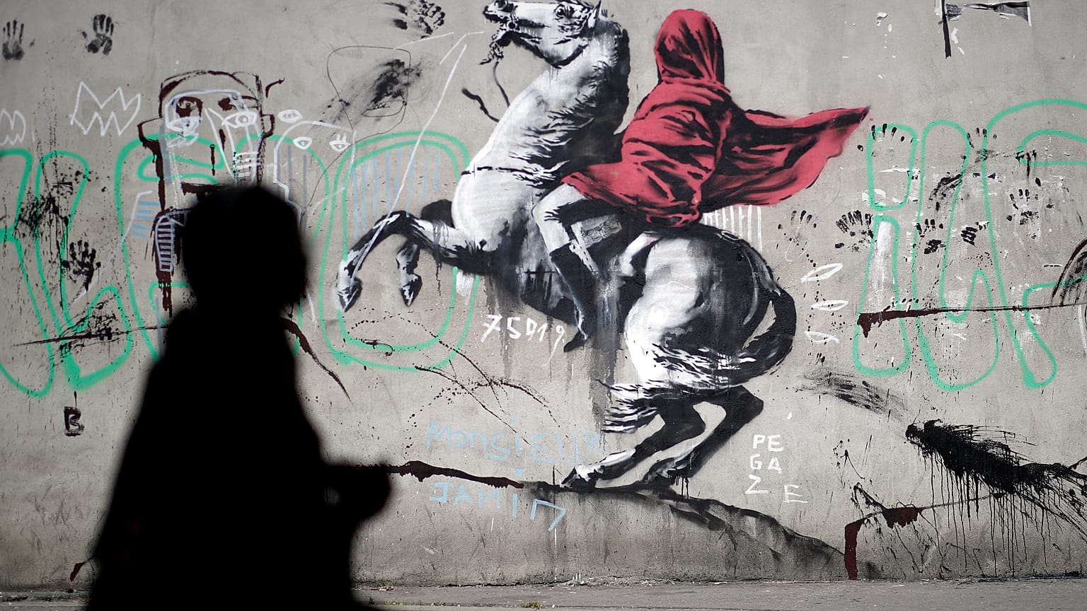 Banksy graffitiken bírálja a francia menekültpolitikát 