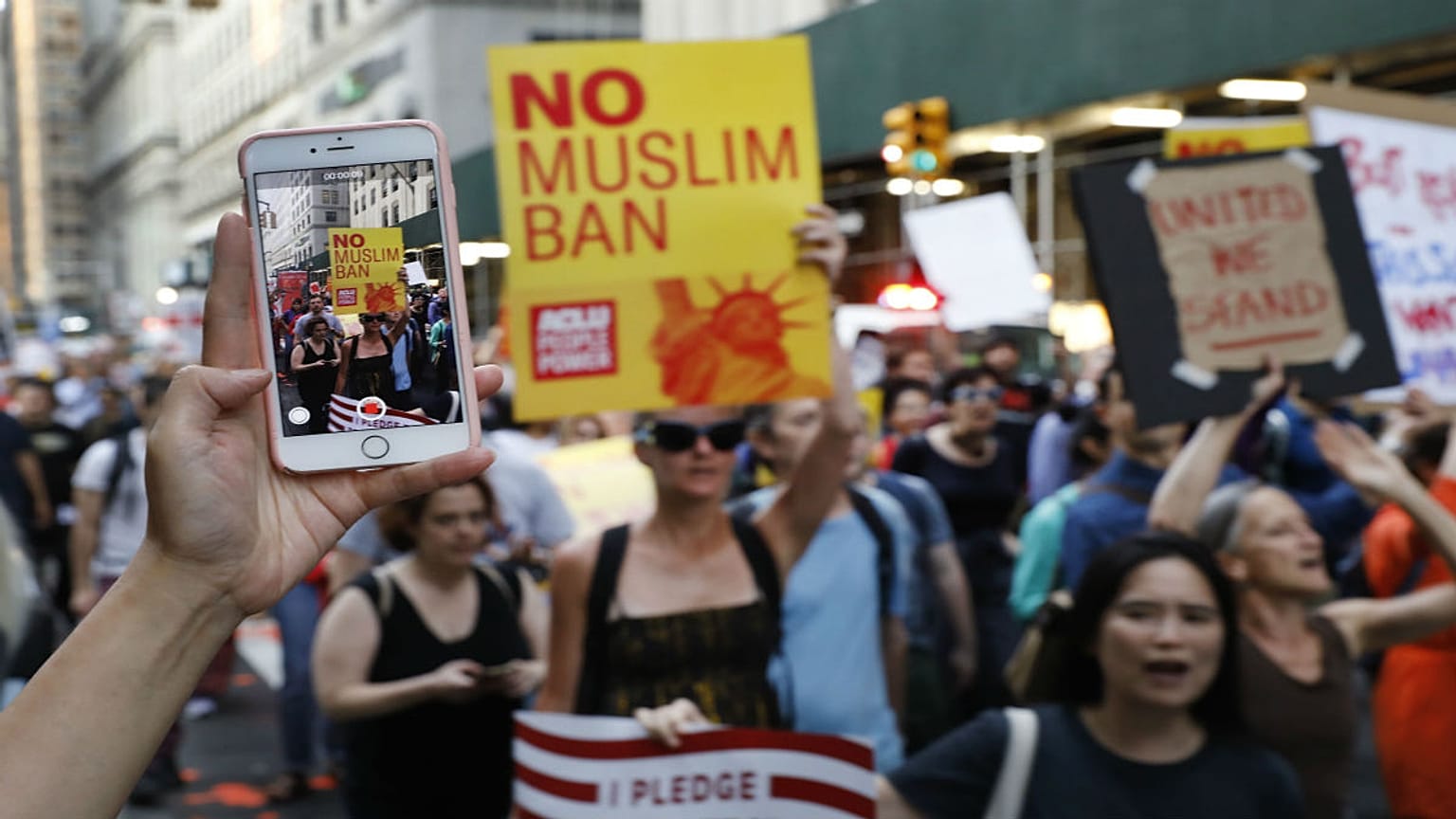 People protesting against U.S. President Donald Trump's immigration policie