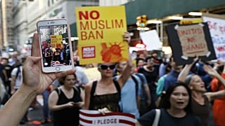 People protesting against U.S. President Donald Trump's immigration policie