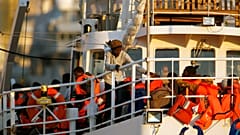 Rescued migrants disembarking in Europe