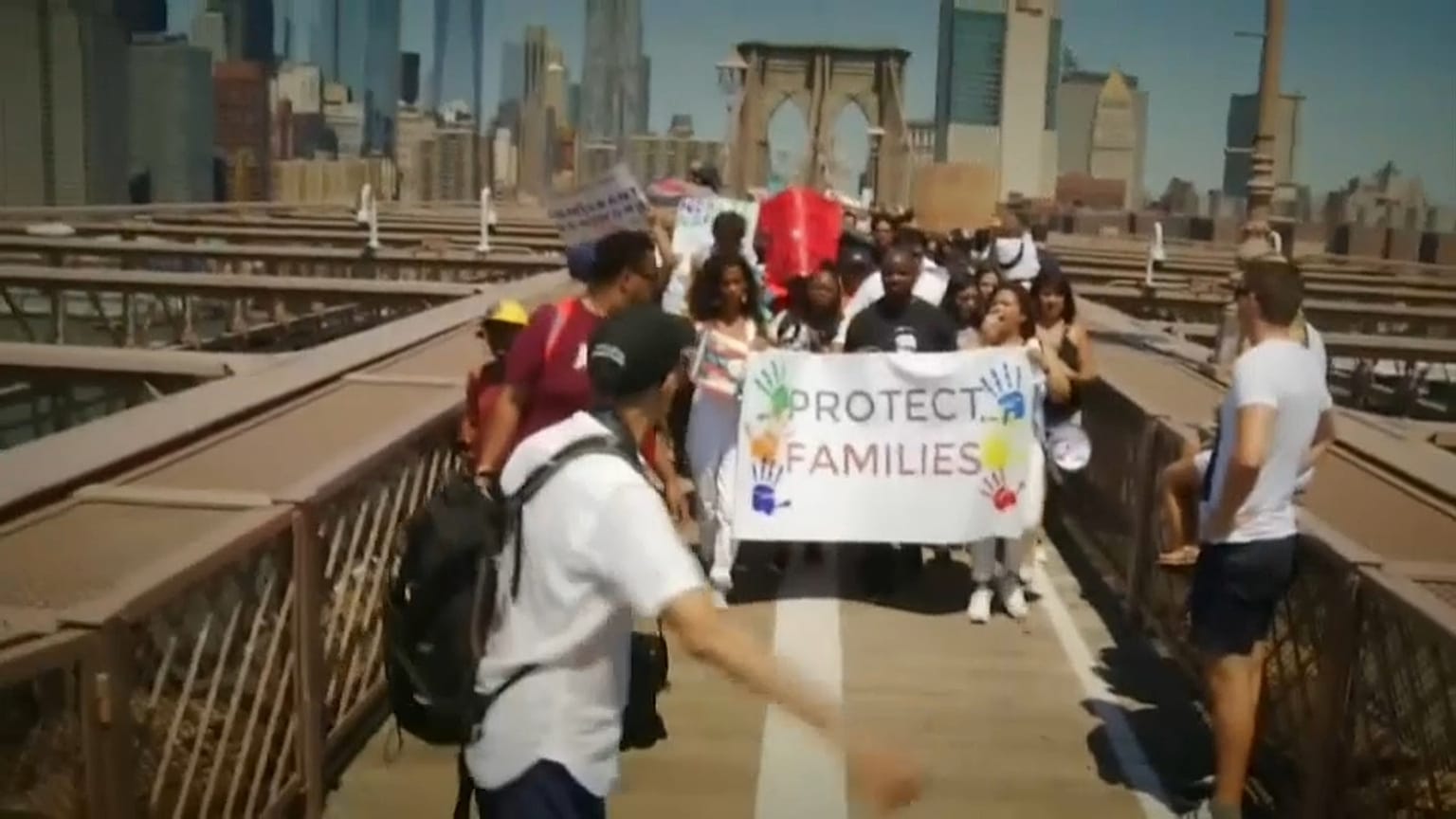 US protestors: “Immigrants Are Welcome Here!”