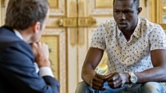 Mamoudou Gassama meeting French President Emmanuel Macron