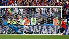 Last 16: Russia's Igor Akinfeev saves a penalty from Spain's Iago Aspas