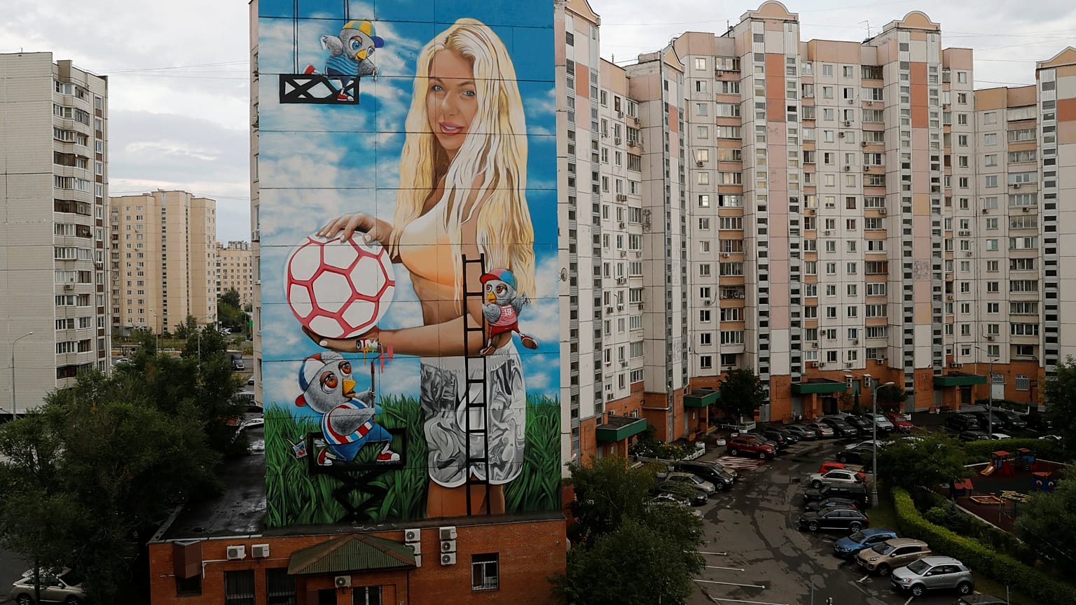 Russian commissions giant mural of his wife with Moscow public funds