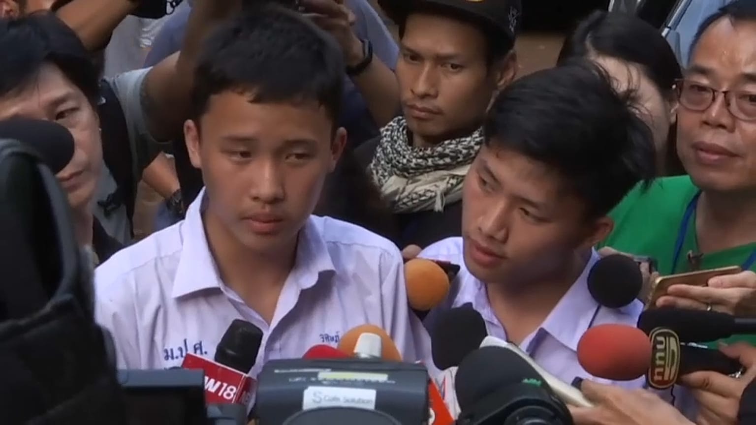 Classmates of trapped Thai boys visit cave