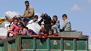 Suriye hükümetinden göçmenlere 'eve dön' çağrısı