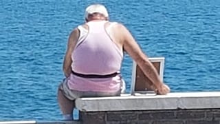 Virales Foto: Ein Witwer, ein gerahmtes Bild und das Meer