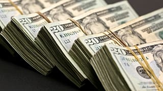 نان در برابر دلار؛ قاچاق دلار از افغانستان در ازاء مواد غذایی ارزان ایرانی