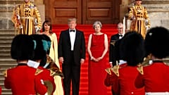Trump, after questioning May's Brexit plan, arrives in 'hot spot' UK