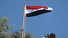 Сирийский флаг над Дераа