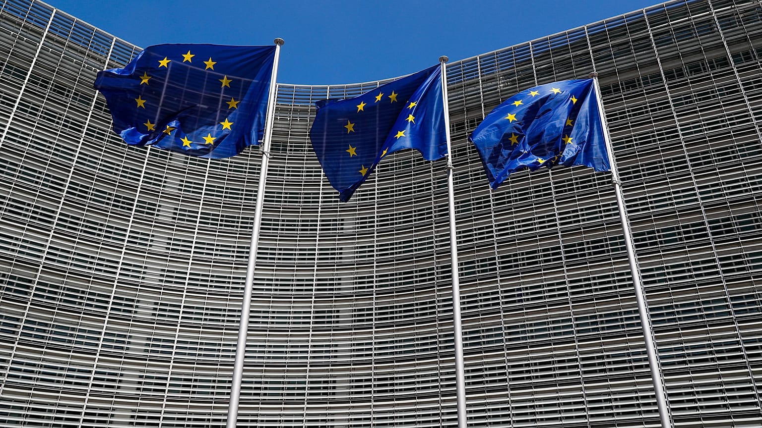 European Union flags outside the EU Commission headquarters in Brussels