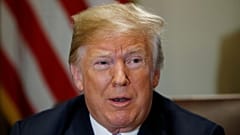 Trump threatens to strip critics of security clearances