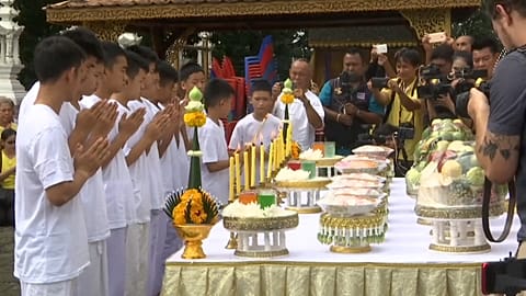 Thai cave boys and their coach attend Buddhist temple ceremony 