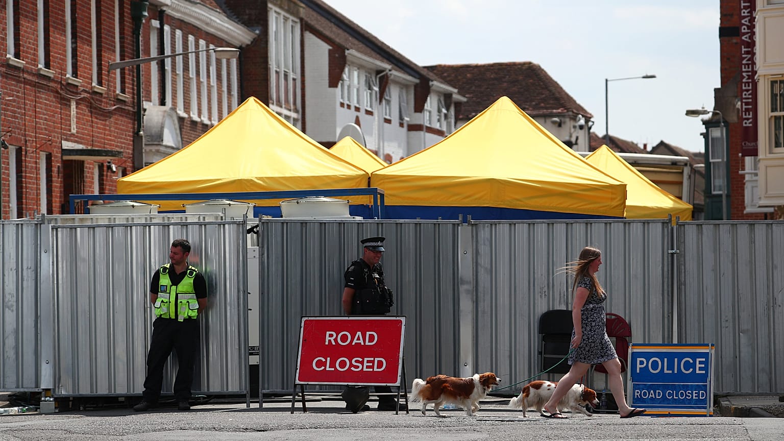 Police guard a sealed-off road