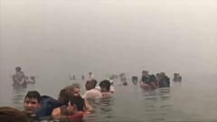 Fuga dramática para o mar no incêndio da região de Ática