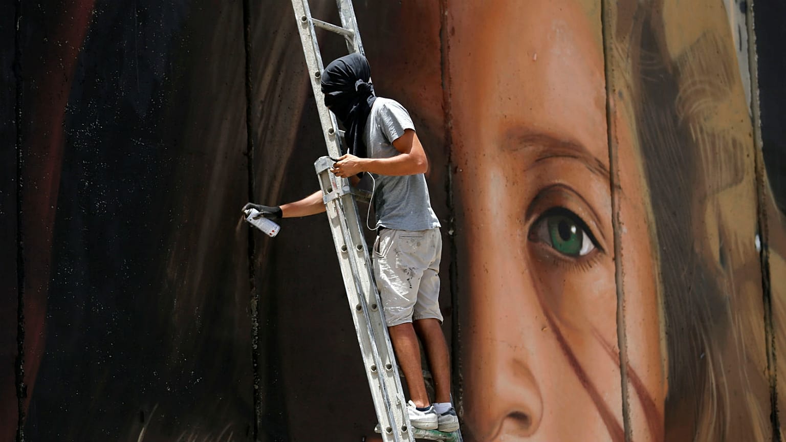 Israel releases Italian street artist arrested over mural of Ahed Tamimi 
