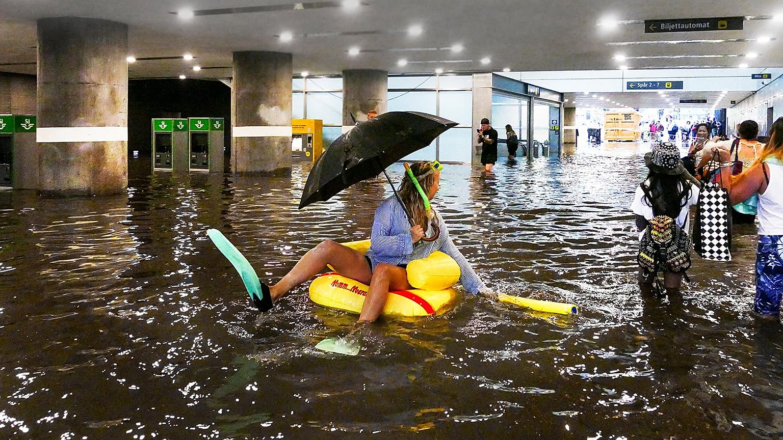 Cooling off? Swedes turn flooded station into swimming pool