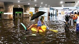 Cooling off? Swedes turn flooded station into swimming pool