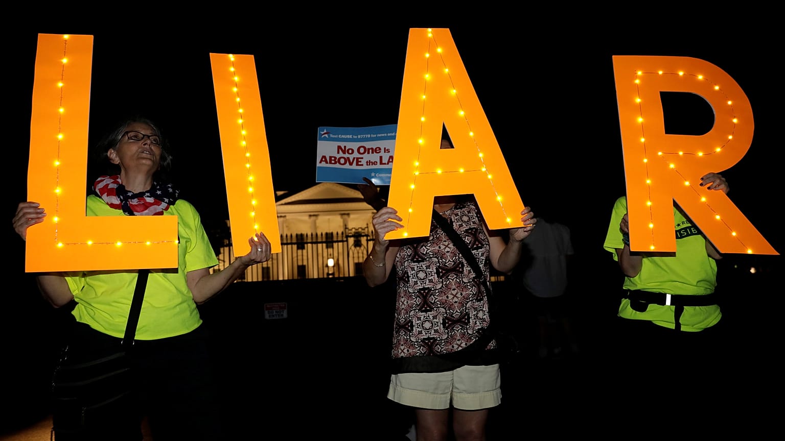 Protesters rally outside the White House in Washington on 16 July, 2018.