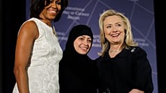 Samar Badawi pictured with Michelle Obama and Hillary Clinton