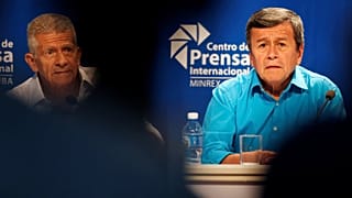 Pablo Beltran, representante del ELN, y Aurelio Carbonell, negociador del E