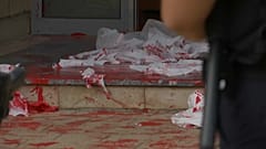 Pintura roja en Kósovo contra la violencia de género