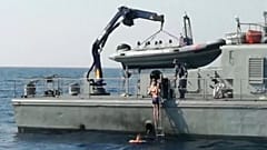 The passenger is rescued from the sea