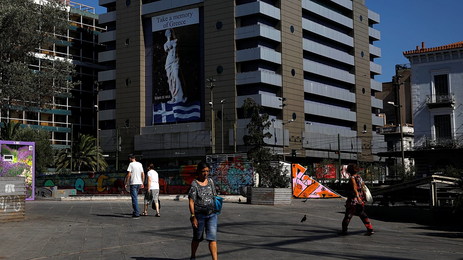 Atenas recebe o fim do resgate sem ilusões 