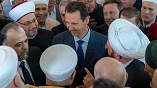 Watch: Syria's Bashar al-Assad attends morning prayers