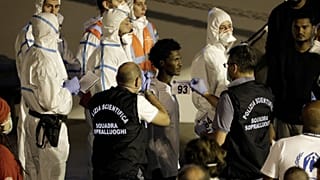 Italy disembarks stranded migrants, Salvini under investigation