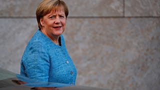 Merkel: egyértelmű migrációs törvény kell