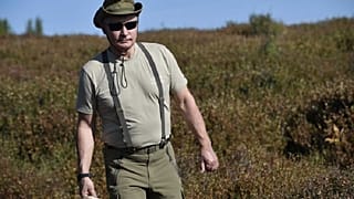 Watch: Russia's Putin enjoys the great outdoors as he hikes in Siberia with top officials