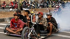 Watch: Crowds gather in Indonesia to celebrate classic Vespa scooter