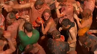 Spain paints the town red with tomatoes