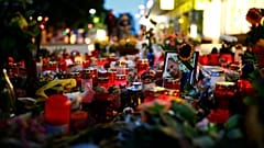 Right-wing supporters protest after a German man was stabbed last weekend
