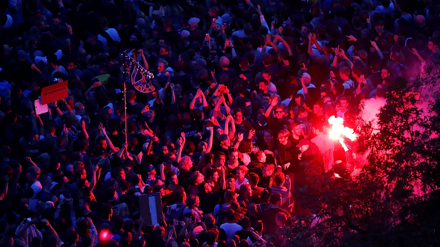 People attend an open air "anti-racism concert" in Chemnitz, Germany 