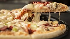Domino’s ends free pizza tattoo campaign early in Russia after too many get inked